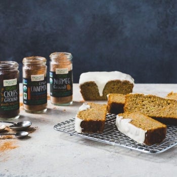 Spiced Vegan Carrot Zucchini Bread with Vanilla Glaze
