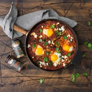 Spicy Mixed Greens Shakshuka with Goat Cheese
